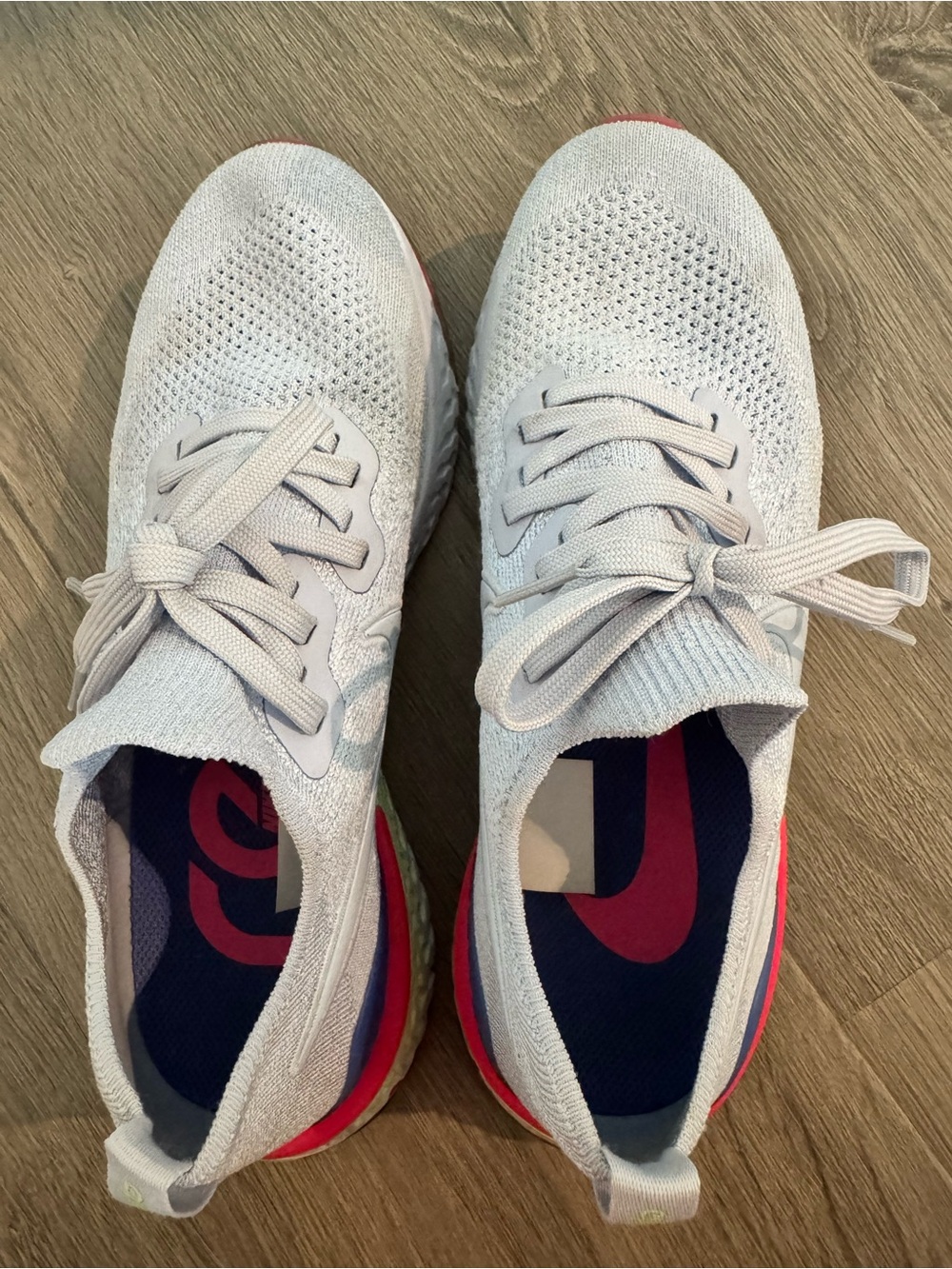 Nike Epic Reacts Women’s Flyknit Running Sneakers with Pink and Blue Accents - Picture 2 of 5